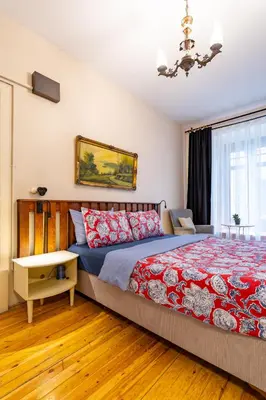 a bedroom with a large bed and a window at Ali Pasha Apartment in Istanbul