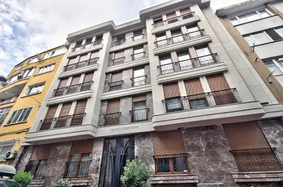 a tall building with windows and balconies on it at New Build with Modern Amenities and Balcony in Istanbul