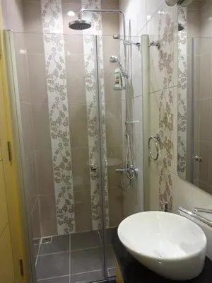 a bathroom with a shower with a sink and a toilet at Bunkahaus in Istanbul