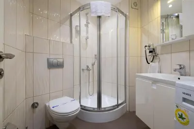 a bathroom with a shower and a toilet and a sink at The Canka Residence And Family Apartment Istanbul City Center - ŞIŞLI in Istanbul