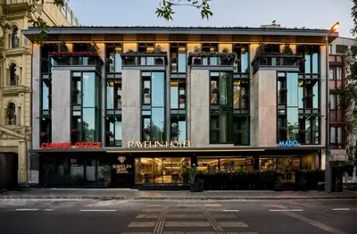 a large building on a city street with a store at Rayelin Hotel Istanbul Old City in Istanbul