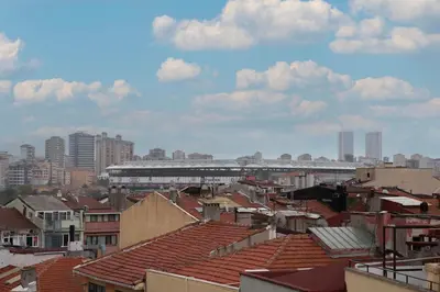 a view of a city with buildings and a train at Rubby Kadıköy in Istanbul