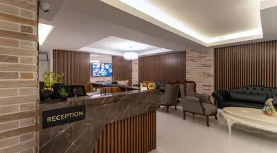 a lobby with a reception desk and a waiting room at Rubby Kadıköy in Istanbul