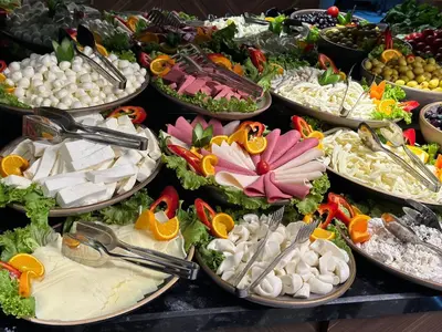 a buffet with many plates of food on display at THE PARK HOTEL in Istanbul