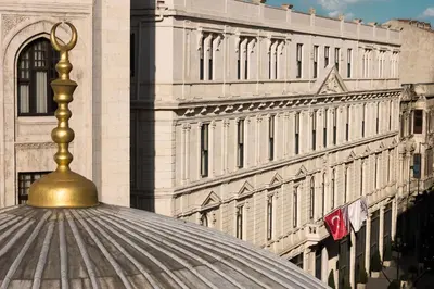 a close up of a building with a gold top at Sanasaryan Han, a Luxury Collection Hotel, Istanbul in Istanbul