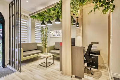 a living room with a couch and a table at Stamboul Hotel & Suites in Istanbul