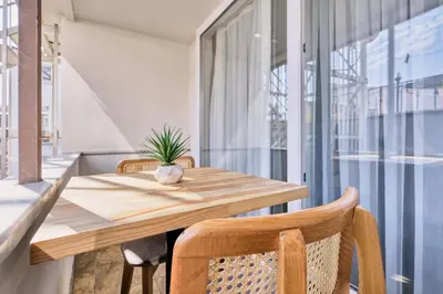 a dining room with a wooden table and chairs at Stamboul Hotel & Suites in Istanbul