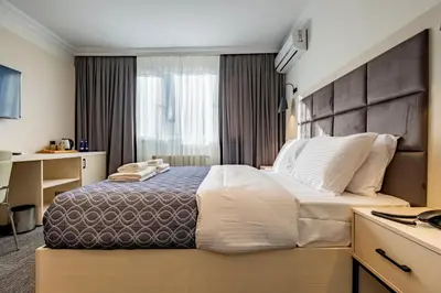 a hotel room with a large bed and a window at Stamboul Hotel & Suites in Istanbul