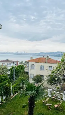 a view of a building with a view of the water at Mansion Miliá in Adalar