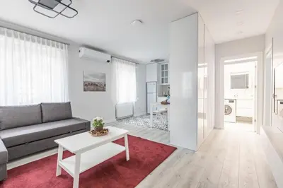 a living room with a couch and a table at Bright Private Modern 2BD1Bath Bebek Gem! #247 in Istanbul