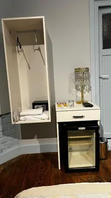 a room with a white table with a mirror at Bali Star City Hotel in Istanbul