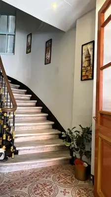 a staircase in a home with a stair case at Bali Star City Hotel in Istanbul