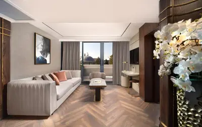 a living room with a couch and a table at Bentley Hotel Old City-Special Class in Istanbul