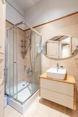a bathroom with a shower and a sink at Warm Rustic Charming 2BD Galata wPatio Gem! #320 in Istanbul