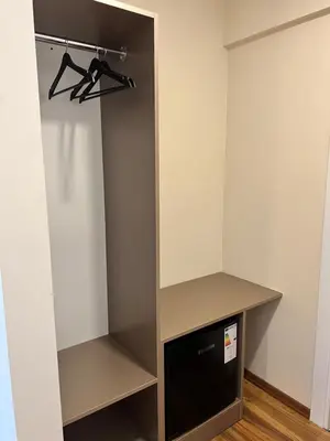 a room with a built in closet with a dishwasher at Taksim Nacre 360 Suit in Istanbul