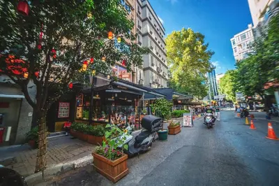 a city street with a motorcycle parked on the street at Stylish Duplex in Beyoğlu with Private Terrace in Istanbul