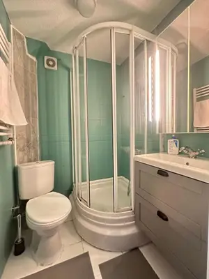 a bathroom with a shower and a toilet and a sink at 5 Min Walk Distance Taksim Square Semi Sea View in Istanbul