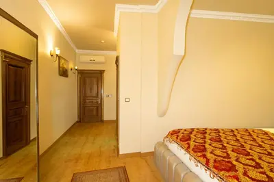 a bedroom with a bed and a hallway at BeyPort Hotel Istanbul in Istanbul