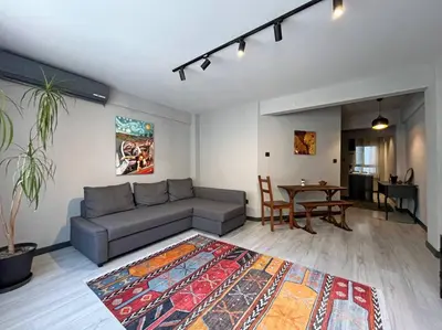 a living room with a couch and a table at Central & cosy flat for 4 Person in Istanbul