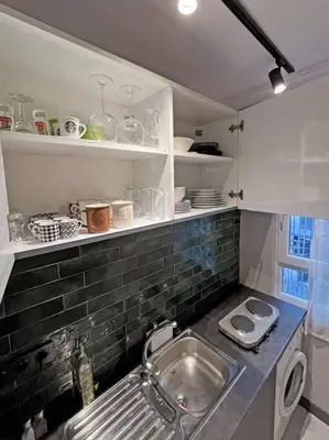 a kitchen with a sink and a counter top at Central & cosy flat for 4 Person in Istanbul