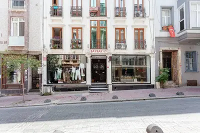a facade of a store on a city street at Prime location with terrace in Istanbul