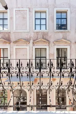 a wrought iron fence in front of a building at Central location with 2 bedrooms in Istanbul