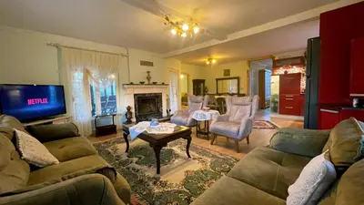 a living room with a couch and a table at Bizim Ev in Sapanca