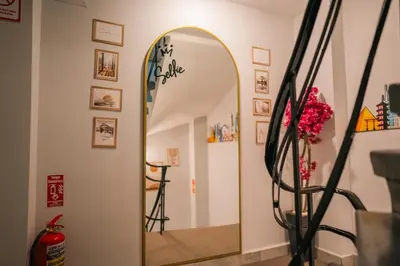 a mirror on a wall in a room at Taksim Santa Lucia Hotel in Istanbul