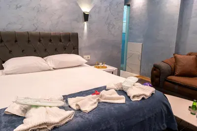 a bedroom with a bed with towels on it at Stay Suite Hotel in Istanbul