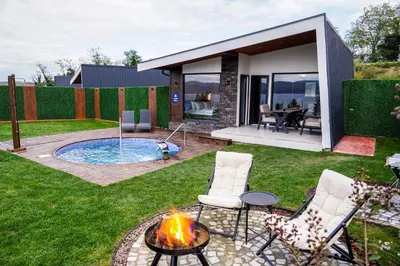 a backyard with a fire pit and a house at Lake Look Sapanca in Sapanca