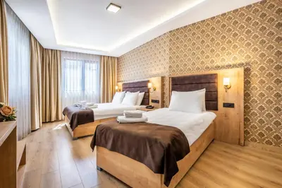 a hotel room with two beds in a room at Emin Palace in Istanbul