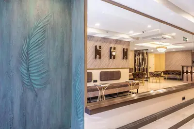 a rendering of a lobby with a palm leaf on the wall at Emin Palace in Istanbul