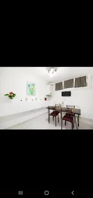 a dining room with a table and chairs in it at 3 FLOOR OLD CITY 1 in Istanbul