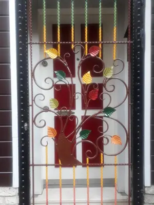 a door with a gate with flowers on it at Newly renovated apartment-studio in Istanbul