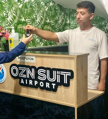a man standing at a podium giving a speech at Ozn Suit Airport Hotel in Arnavutköy