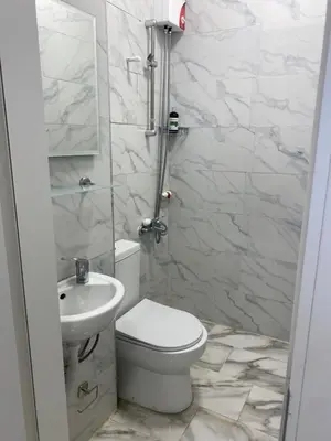 a bathroom with a toilet and a sink at hotel yenikapı in Istanbul