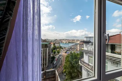 a view of a city from a window at Karakoy Aparts Hotel - Special Category in Istanbul