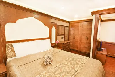 a bedroom with a large bed in a room at Kumluk Konak Hotel in Istanbul