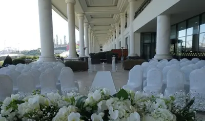 a row of white flowers in a building at Vialand Palace Hotel in Istanbul