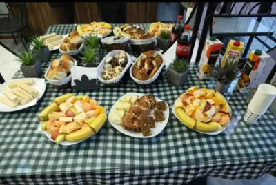 a table topped with plates of food on a table at Yuvam Vari Hotel in Istanbul