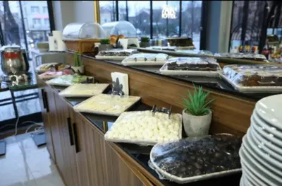 a buffet line with many different types of food at Yuvam Vari Hotel in Istanbul