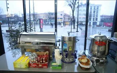 a counter top with a food blender and food at Yuvam Vari Hotel in Istanbul