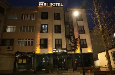 a tall building with a sign for a van hotel at Yuvam Vari Hotel in Istanbul