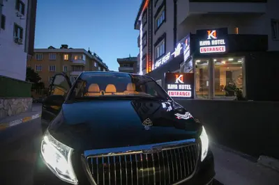 a black car parked in front of a store at Kaya Hotel SAW in Istanbul