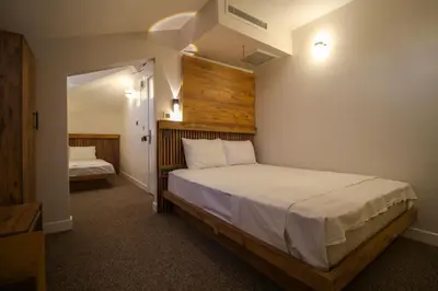 a bedroom with a large bed in a room at Kaya Hotel SAW in Istanbul