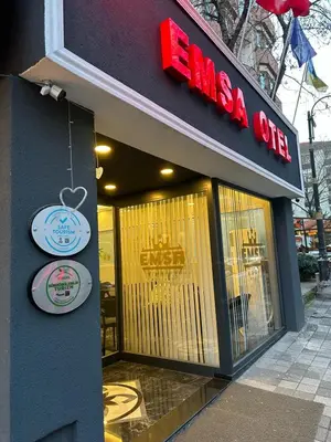 a store front of a restaurant with a sign on it at Emsa Otel Maltepedeki Eviniz in Istanbul
