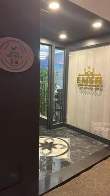 a entrance to a building with a sign on the wall at Emsa Otel Maltepedeki Eviniz in Istanbul