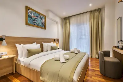 a hotel room with a large bed and a window at Joyway Hotels Istanbul Sultanahmet in Istanbul