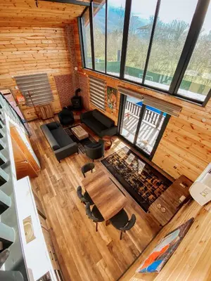 an overhead view of a living room with a table and chairs at SAPANCA FAMİLY RESORT in Kartepe