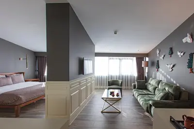 a bedroom with a bed and a couch at Hotel Miniature Istanbul in Istanbul
